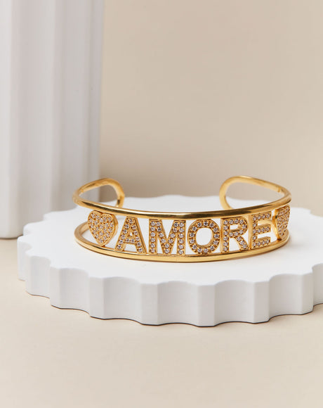 Styled product photography of the Amore Bangle.