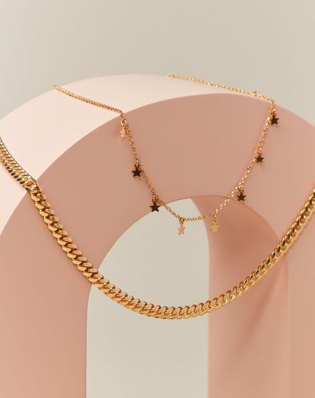 Style product photography of the Adriana and the Navona Gold Chain.