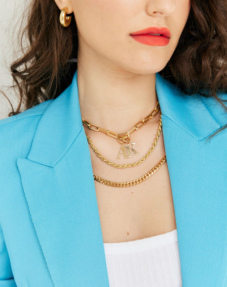 Model wearing the Navona Gold Chain, the Francesca Rope Chain and the Roma Chain.