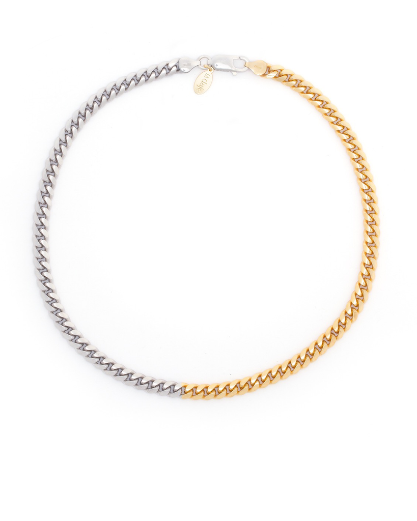 Two-tone Cuban Style Chain Made with 2.5 Microns of 18K Gold Vermeil on 925 Sterling Silver with Anti-Tarnish and Rhodium on Sterling Silver. 40cm length, 6mm width with lobster clasp.